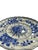 A vintage hand-painted royal delft wall plate by de porceleyne fles. The plate has a fluted, scalloped form with a raised...