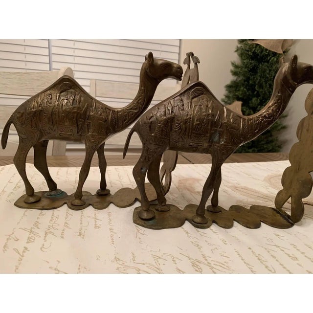 Vintage Mid Century Brass Camel Bookends With Ornate Hieroglyphs and symbols. Pictures are considered part of description...