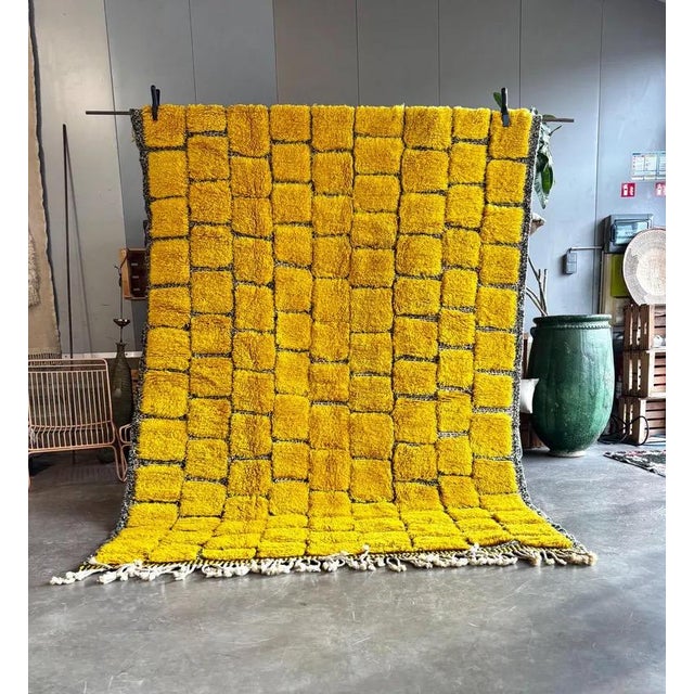 This new handmade Mrirt Moroccan rug is a refined and contemporary interpretation of traditional Berber craftsmanship....