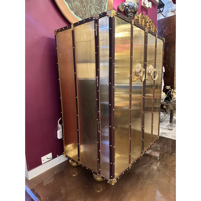 Costume Dry Bar cabinet. The exterior is all brass plated including the bronze handles with a gold bath, all the frames in...