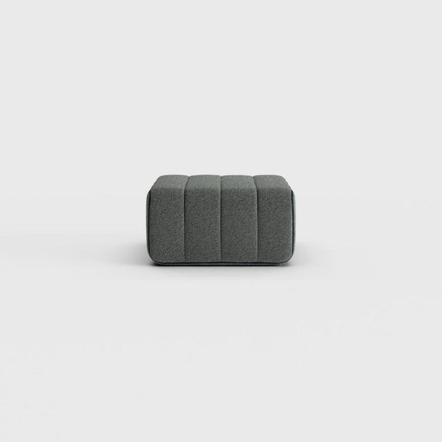 Pouf, stool, ottoman—or simply the building block for what is probably the world’s most versatile sofa system? The Curt...
