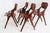 An elegant and highly sculptural set of four Danish Modern dining chairs designed by Arne Hovmand-Olsen and produced by...