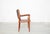 Condition: frame made of solid teak. Seat and backrest upholstered in dark gray faux leather. Two chairs available. hans...