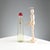 Yellow glass bottle with red cap. Designer's signature and manufacturer's sticker. Bottle height 29.5 cm. Original box....
