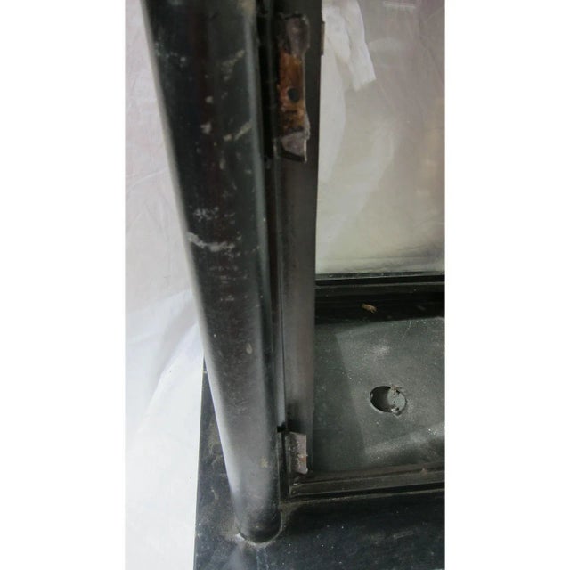 This is an old gas streetlight from San Francisco, that was beveled glass inserts on three sides. The hinged side to open...