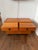 An exceptional pair of authentic Danish Modern rolling bedside cabinets designed by Axelsens Møbelfabrik for W&B Møbler,...