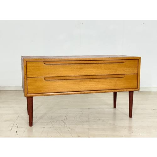 For sale is a high-quality vintage lowboard from the 1960s by WK Möbel. Clean lines, warm teak grain, and delicate,...