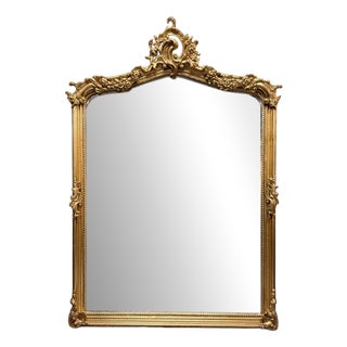 French Carved Scroll Mirror in Gilt Finish For Sale