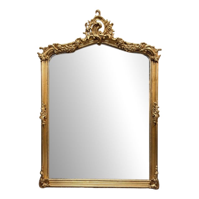 French Carved Scroll Mirror in Gilt Finish For Sale