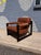 Exceptional Mid-Century Modern lounge chair by Percival Lafer, crafted in Brazil from richly figured Brazilian rosewood...