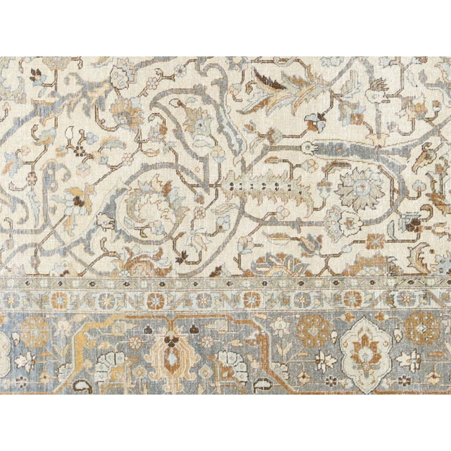 This Semi Antique Persian Tabriz Rug is a timeless and unique addition to any home. Handcrafted with intricate designs and...