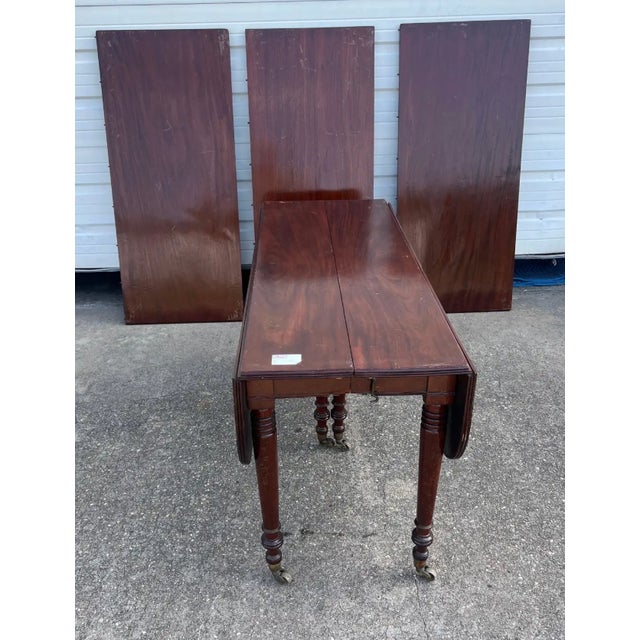 Fine late 18th-early 19th century French directoire mahogany dining table that captures that moment in time between the...