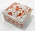 Charming vintage porcelain lidded box featuring whimsical Asian scene to lid and decorated sides to base. Footed with...