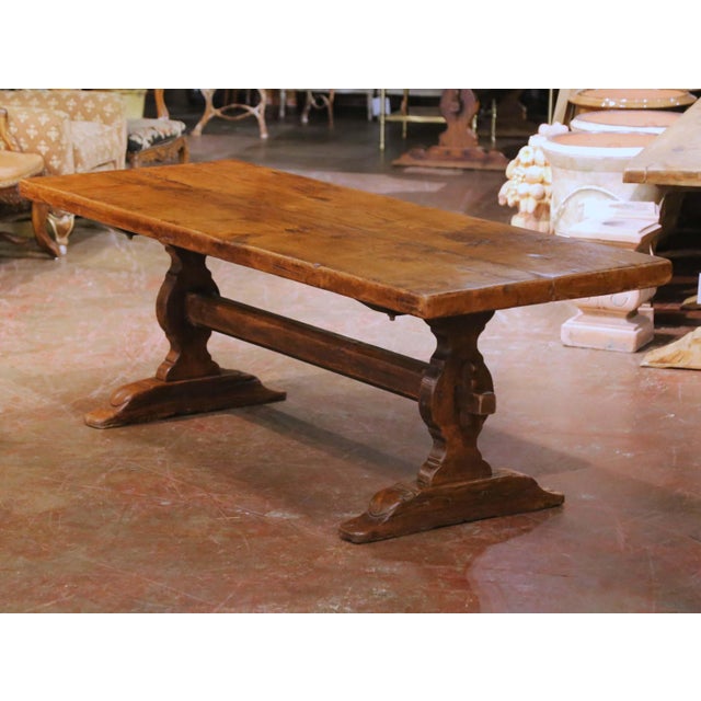 Crafted in France circa 1880, this exceptional antique refectory table is built from solid oak and exemplifies the robust...