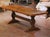 Crafted in France circa 1880, this exceptional antique refectory table is built from solid oak and exemplifies the robust...