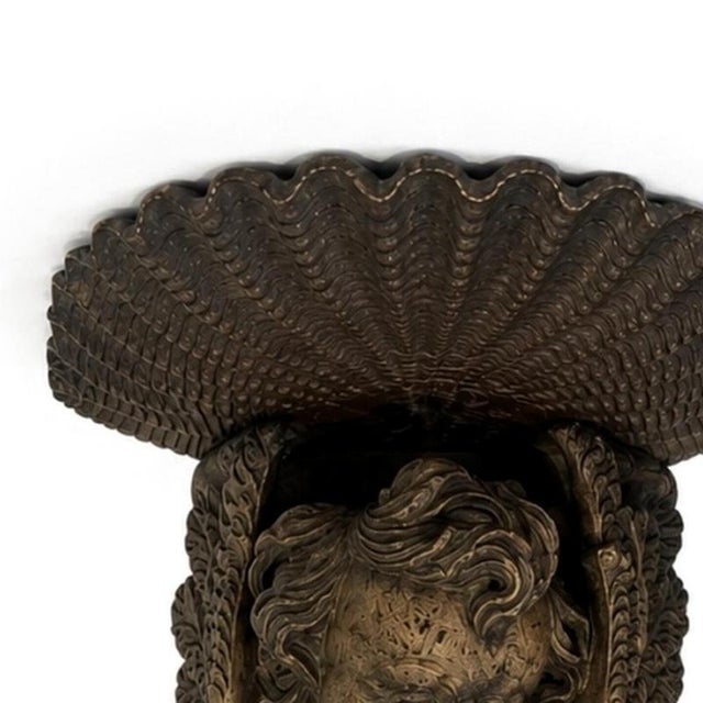 Sacred Art - Pair of corbels. Portuguese, 20th century; carved chestnut wood decorated with angels' faces. Dimensions:...