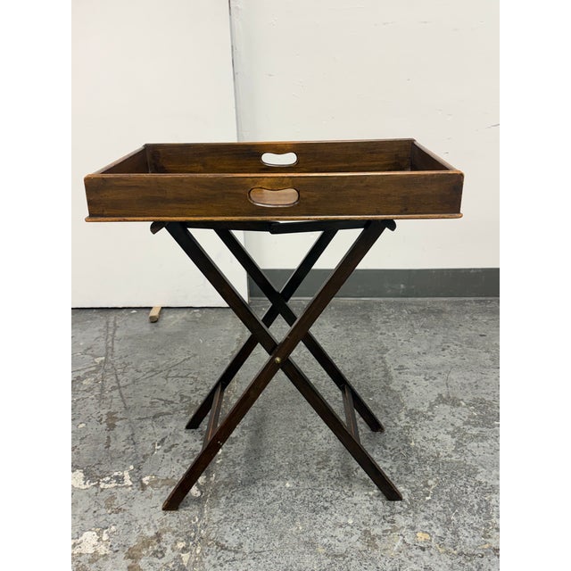 Design Plus Gallery presents a Vintage Folding Wood Butler’s Tray Table. The removable rectangular tray has inset wood...