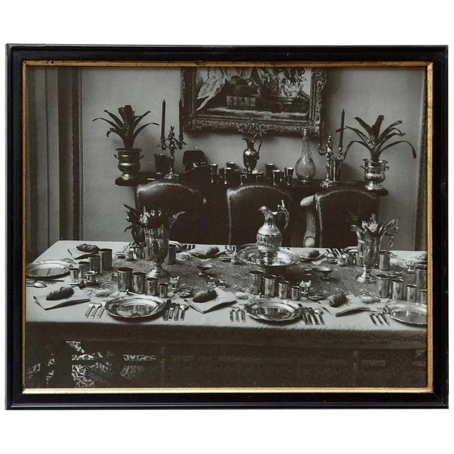 Step back in time with Brassai's captivating lens as he beautifully frames a dinner table in 1935 Paris. This black and...