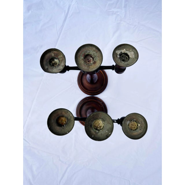 Pair of antique wooden candelabras dating 19th century from either England or France in impeccable shape. Charming old wax...