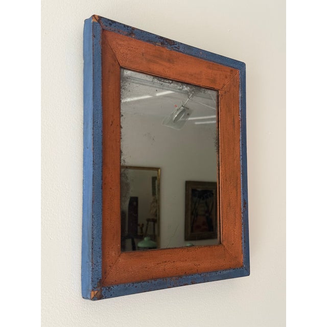 This is a fabulous folk art mirror with the original mirror plate and unique blue and salmon colored paint. This piece has...