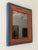 This is a fabulous folk art mirror with the original mirror plate and unique blue and salmon colored paint. This piece has...