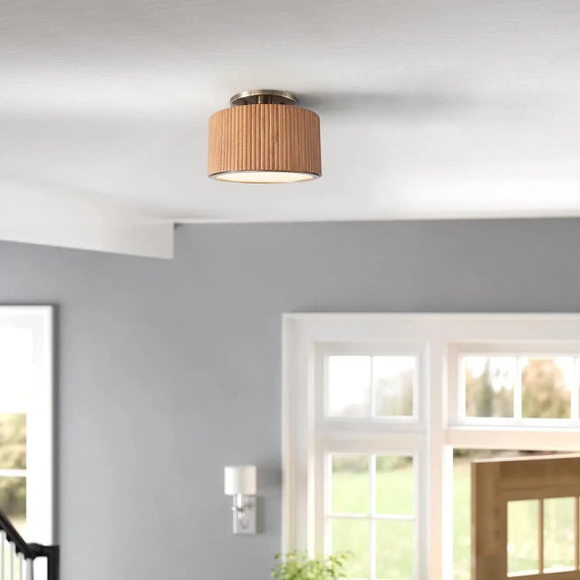 Introducing the Tambo Semi-Flush mount ceiling light, a testament to modern design where the intricate artistry of hand-...