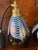Vintage Italian irridescent glass with feathers perfume bottles with atomizer.
