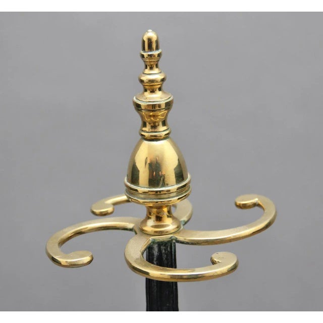 - Early 19th Century brass and cast iron stick stand - Lovely brass finials above four scrolled arms raised on a reeded...