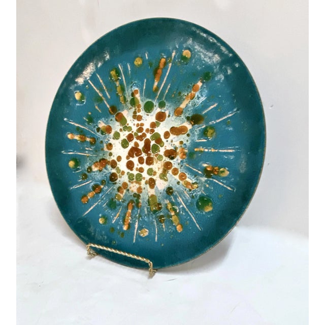 This is an impressive 18" diameter Enamel-on-Copper charger that was deigned and created by the well-known Mesick Studios....