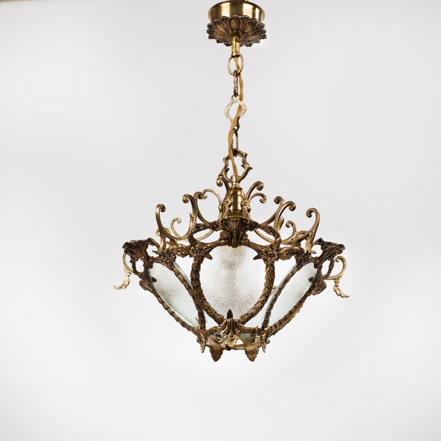 Elevate your space with the palace-like grandeur of this vintage Spanish pendant chandelier, handcrafted in Spain circa...