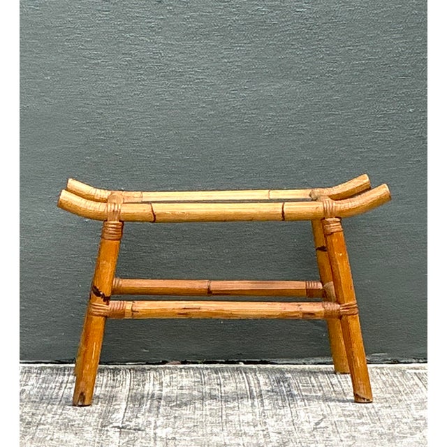 This exquisite vintage pagoda-style drinks table captures the essence of Chinoiserie-inspired design with its distinctive...