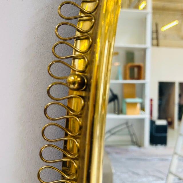 Very large brass mirror by Josef Frank for Svenskt Tenn. High-quality workmanship. This piece is attributed to the...