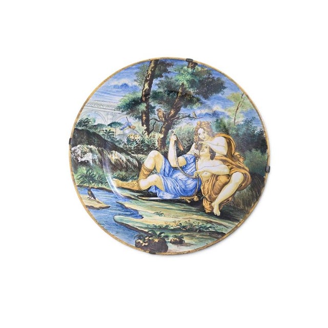 A magnificent and exceptionally large Italian polychrome maiolica charger dating from the late 19th century, decorated...