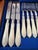 A beautiful antique circa 1890-1910s dessert or luncheon flatware service for 12 in its original case. The flatware...