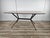 Vintage dining table with iron structure and formica top, ideal for a modern or vintage style room. Note the particular...