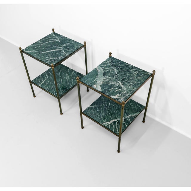 A matched pair of mid century brass and gilt metal étagère / side tables, each with two tiers of Verde Antico marble....