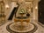 This dramatic late 20th-century Italian table combines sculptural Baroque design with traditional decorative painting....