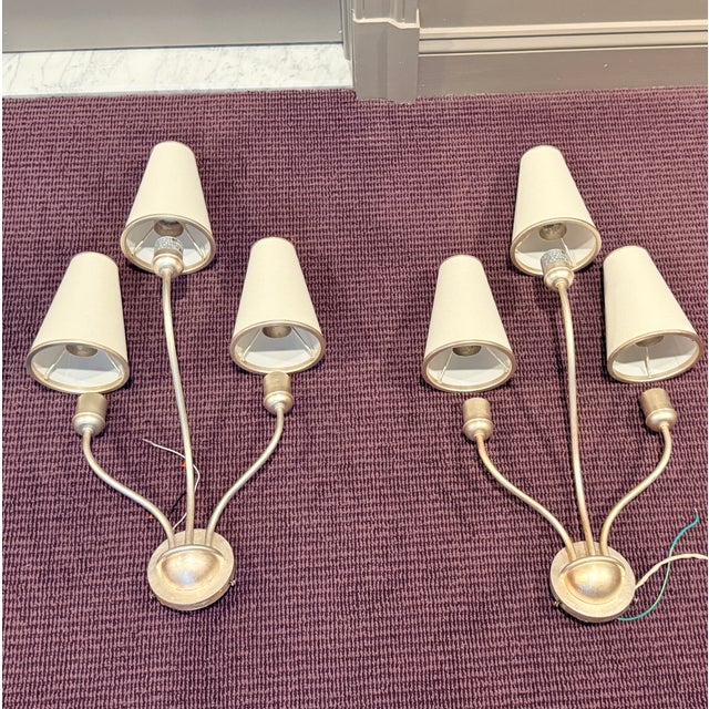 PAIR Visual Comfort AERIN Montreuil Small Wall Sconces A pair of elegant three arm wall sconces in a burnished silver leaf...