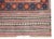 A wonderful mid 20th century Persian Afghani Baluch runner covered with diamonds all over the field and arranged into...