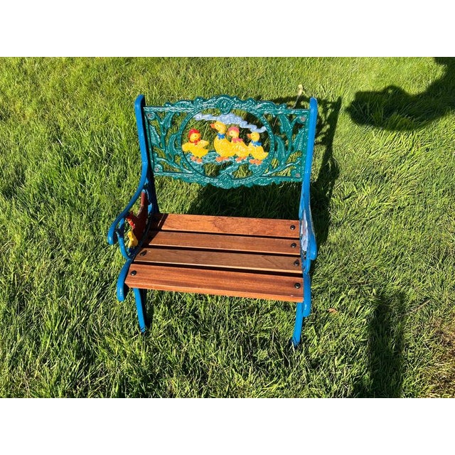 Cast iron and mahogany children’s chair