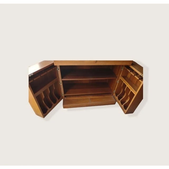 This is a very nice server. Measures 72" when opened. 36" Closed wide, 21" depth, and 30". Bar cabinet opens to 72" when...