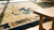 Brown Early 20th Century Chinese Peking Carpet with Eight Immortals Playing Weiqi "Go" For Sale - Image 8 of 8