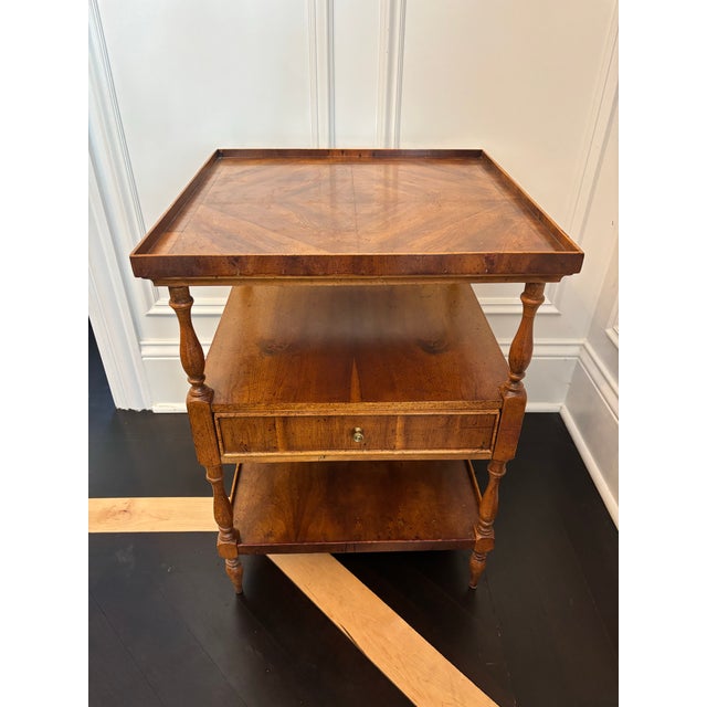 Offered is a traditional accent side table by American of Martinsville. This classic piece features one smooth gliding...