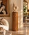 Beautiful 1970s vintage Boho Chic cylindrical pedestal featuring a distinctive diagonal pencil reed design with warm...