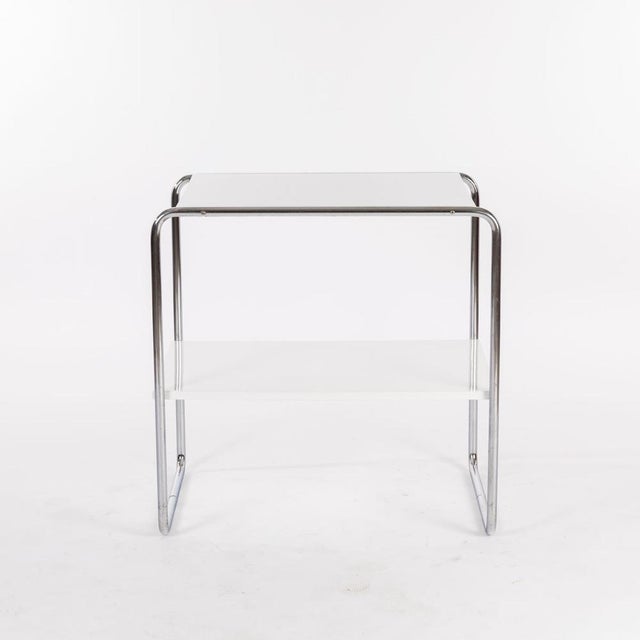 The tops are painted white. The frame is made of chrome -plated steel tube. I have official proof of authenticity such as...