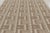 Handwoven in wool, this 9x12 Scandinavian rug presents an architectural geometric design in soft beige and ivory. Layered...