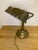 Brass desk lamp base. It does not have the working parts, but could easily be rewired.