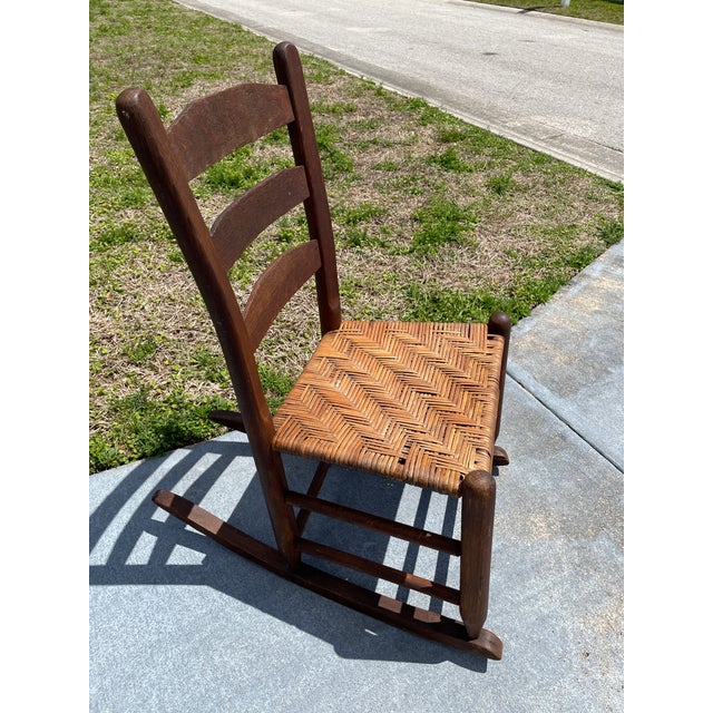 Antique Child's Cane Rocking Chair in Good Condition.