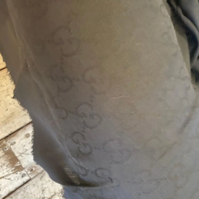 A Never Used Black Wool Scarf by Gucci With Continuous Logo For Sale - Image 11 of 12