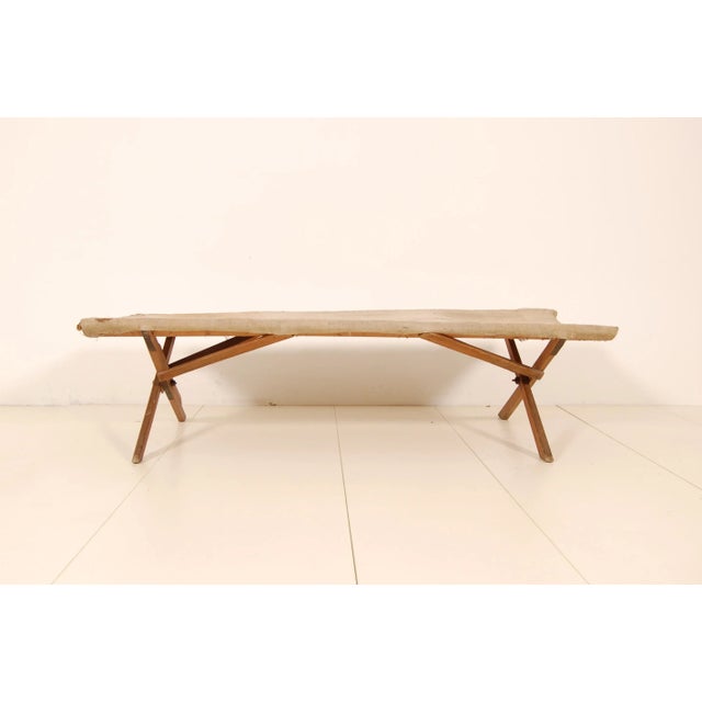 Old military bunk dating back to the 1940s or so. Wooden frame and jute bags sewn together. The upper part of the jute is...